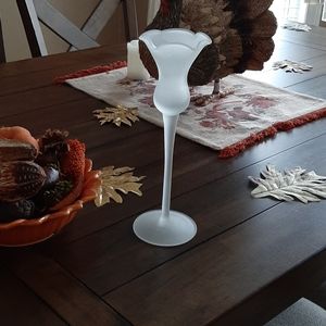 Delicate glass stemmed candle holder